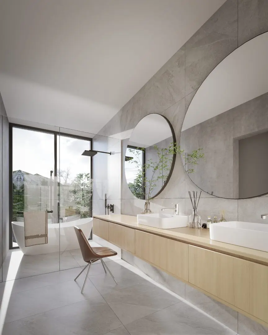 A bathroom with two sinks and large mirrors.